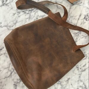 Unique raw leather convertible purse/backpack